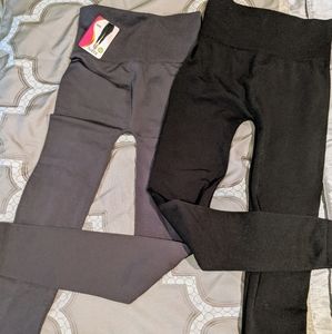 2 pairs of Sofra high waist leggings.
